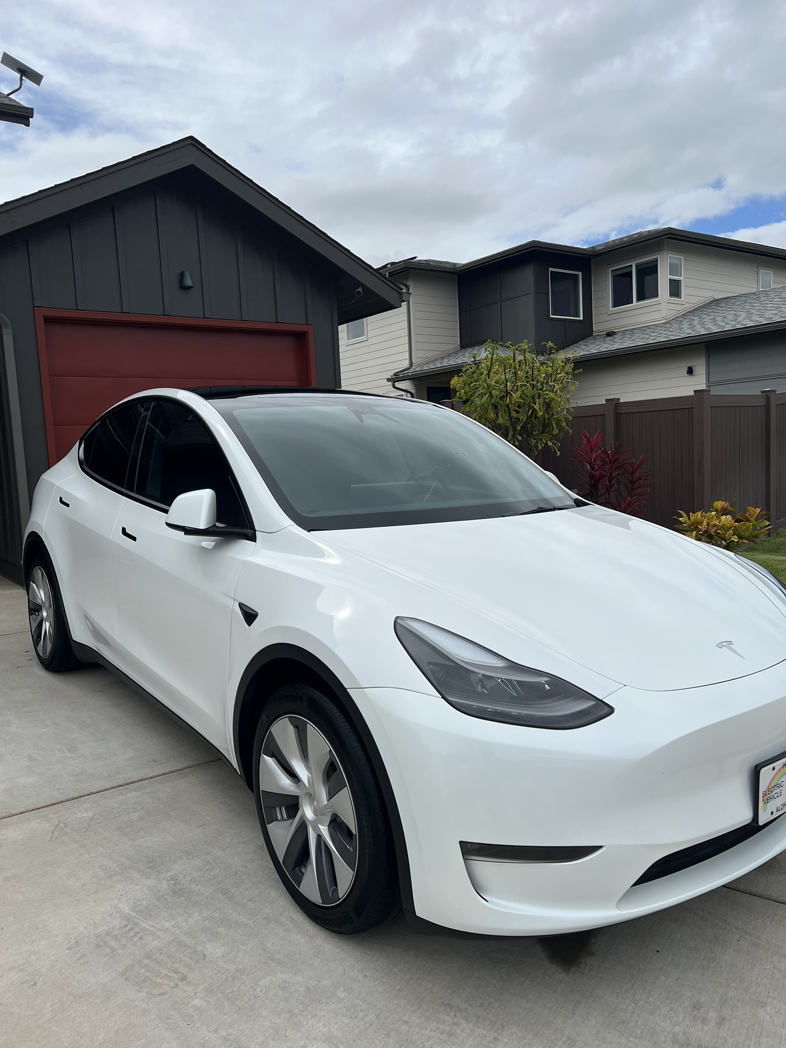 White Tesla Model Y mobile detailing Kapolei driveway Oahu
