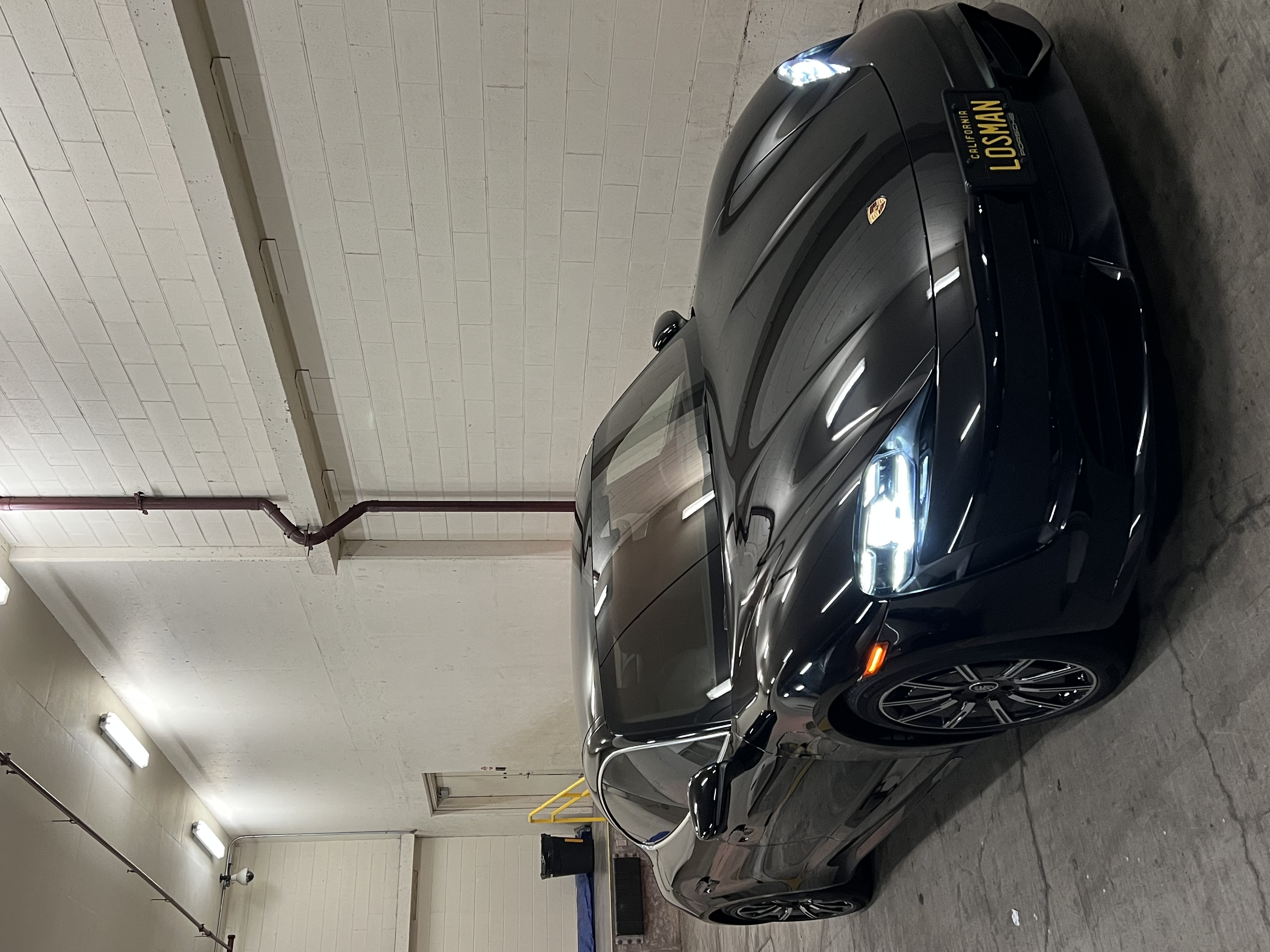Black Porsche Taycan detail Oahu